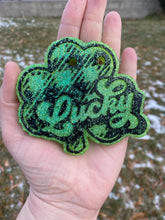 Load image into Gallery viewer, Plaid Lucky Shamrock Freshie Mold, smiling lucky clover freshie mold, St Patrick&#39;s day freshie mold, Irish freshie mold, silicone soap molds
